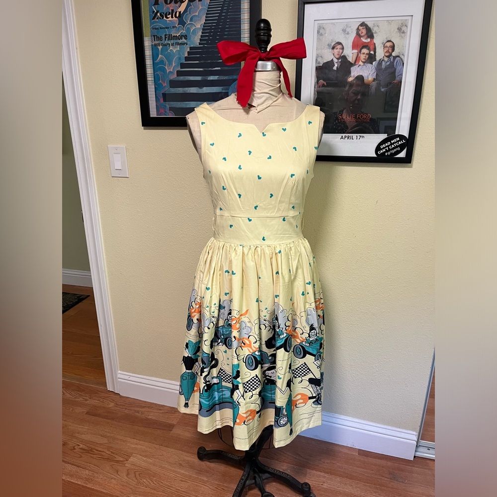 Yellow 50s pinup dress with kitschy car racing print
